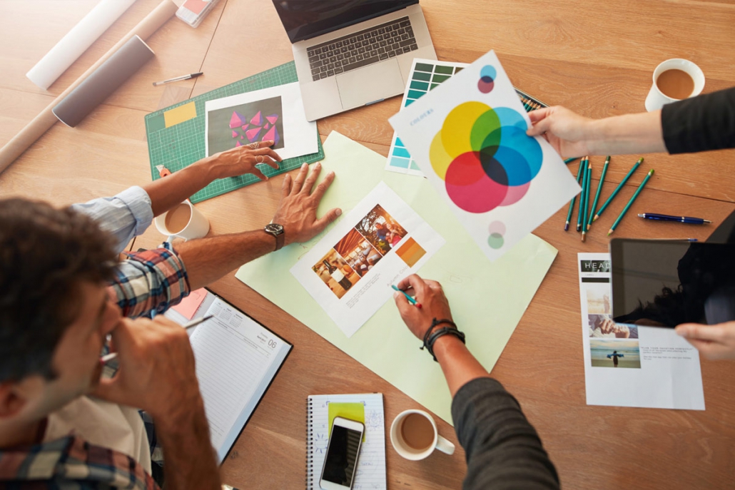 Collaborative Meeting with marketing materials on table